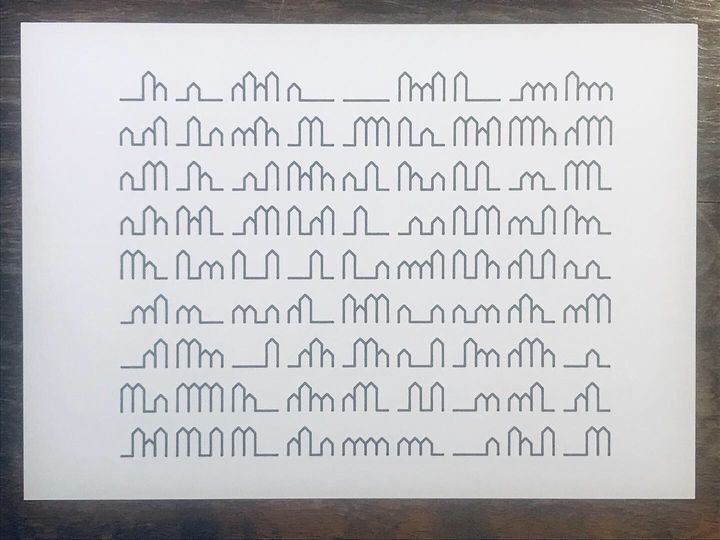 4 trits blocks of houses, black on white, shuffled and apart